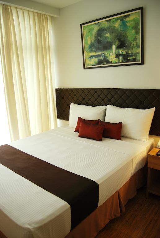 Capitol Central Hotel And Suites Cebu Phòng bức ảnh