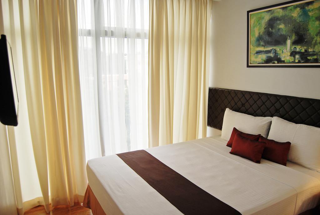 Capitol Central Hotel And Suites Cebu Phòng bức ảnh