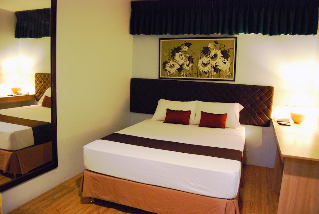 Capitol Central Hotel And Suites Cebu Phòng bức ảnh